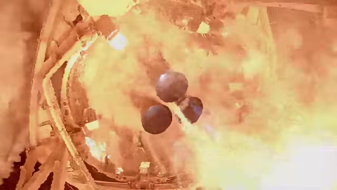 Three Raptor engine nozzles glowing orange during SN8 ignition