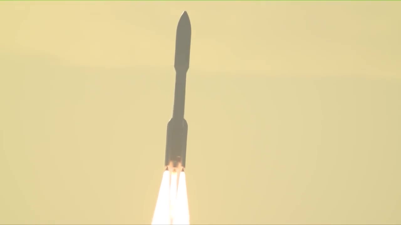 Atlas V climbing on three bright engine plumes