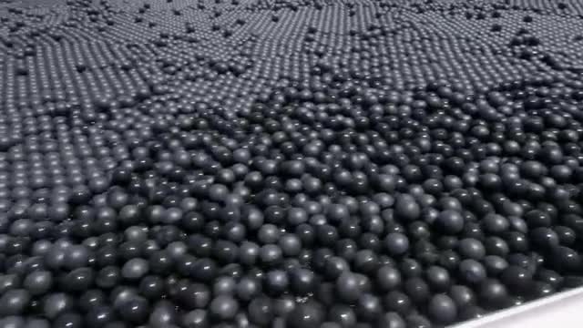Black shade balls covering a reservoir