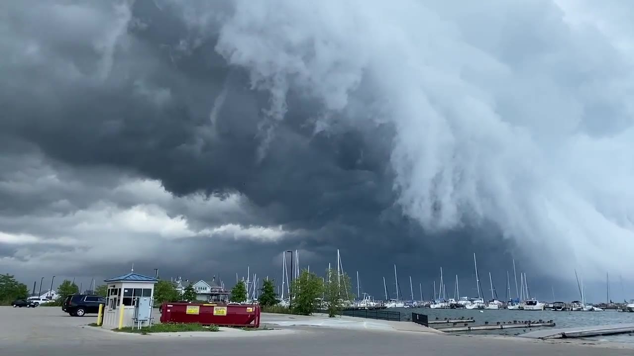 Shelf cloud rolling over a Lake Michigan marina