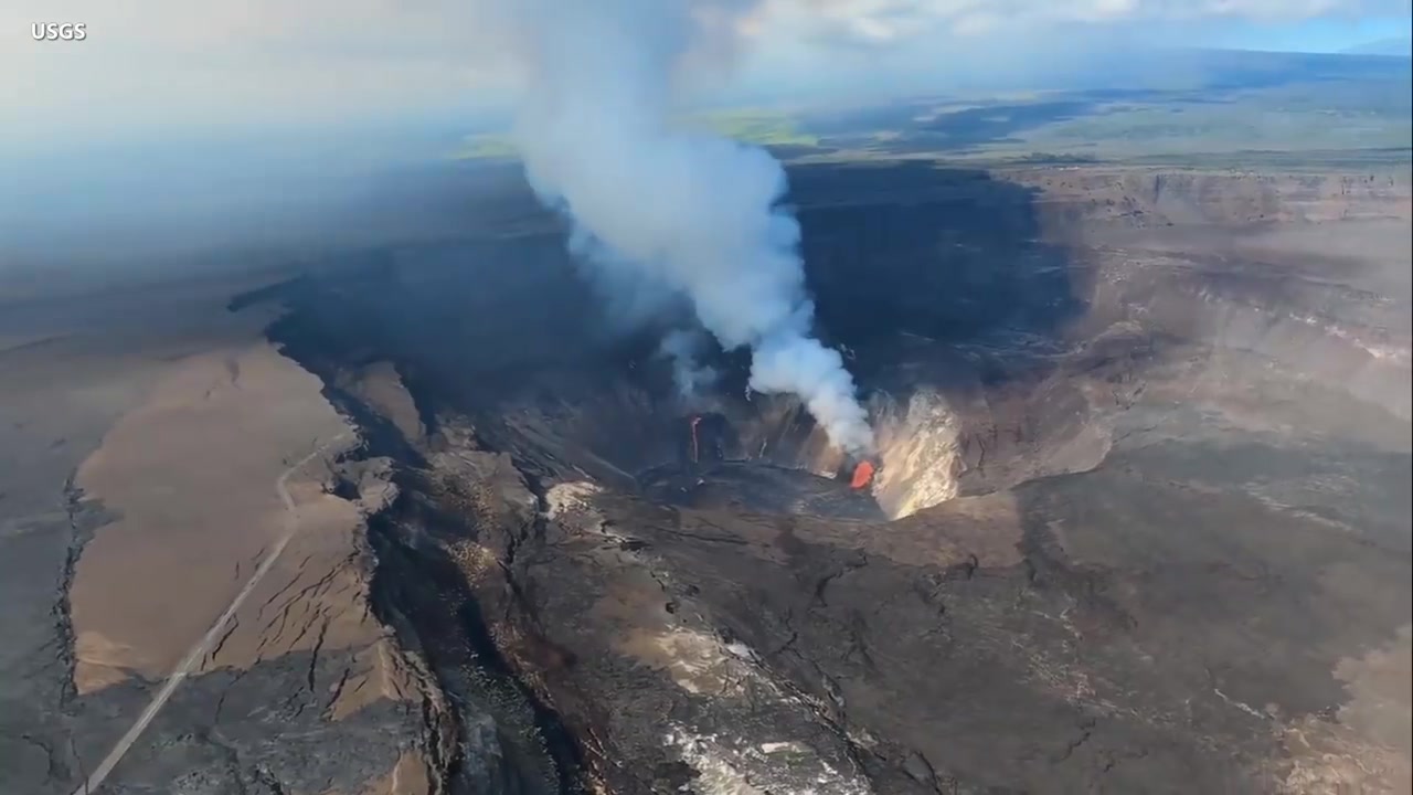 Aerial view of Halemaumau with steam plume and glowing lava on Dec 24 2020