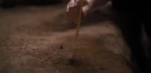 A brush working sediment at an excavation