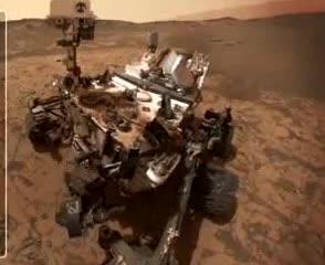 A rover on the rocky surface of Mars.