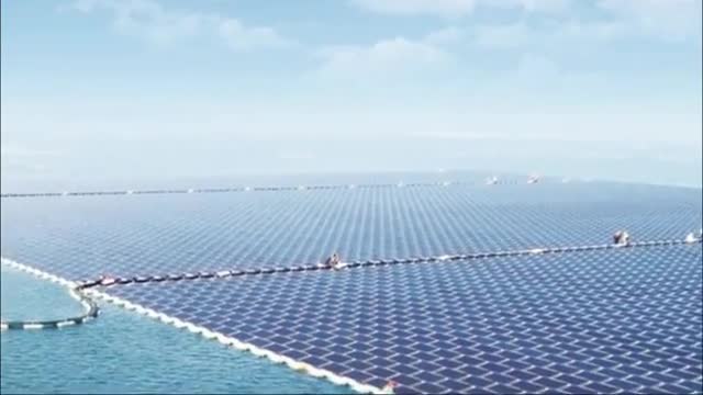 Rows of solar panels floating on a lake