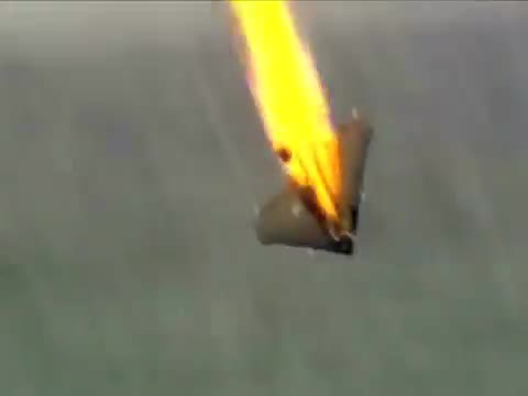 A target burning as a laser weapon hits it