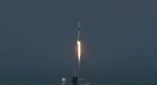 A rocket climbing with a bright exhaust plume.