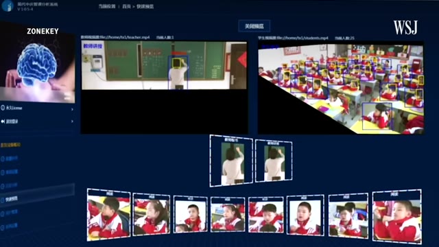 Classroom wall of cameras facing rows of students