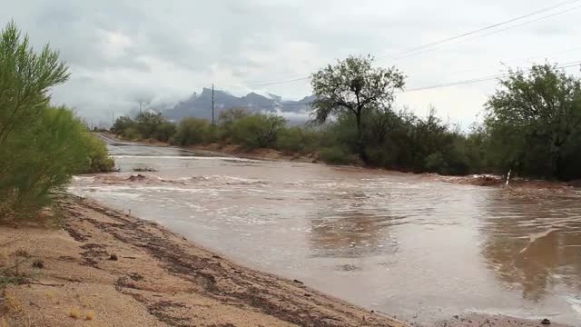 Floodwater running through a dry desert wash