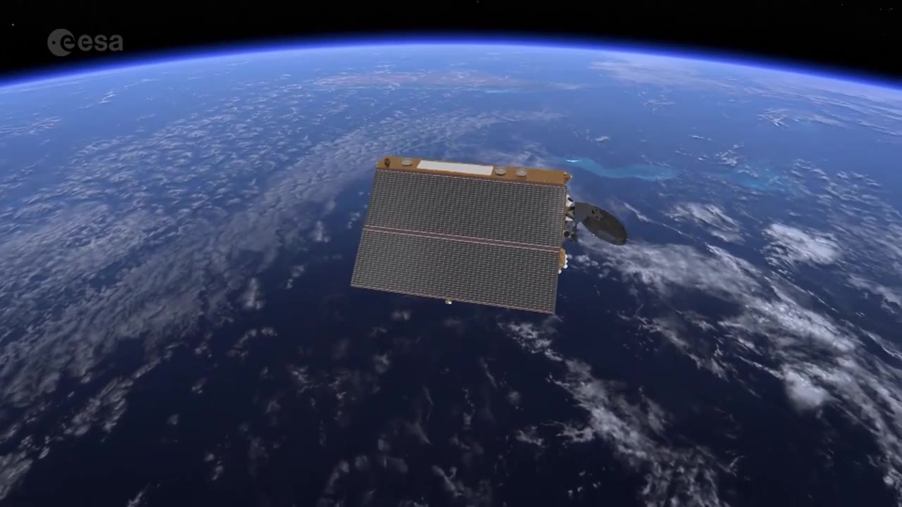 Sentinel-6 satellite with solar wings above blue ocean and white clouds