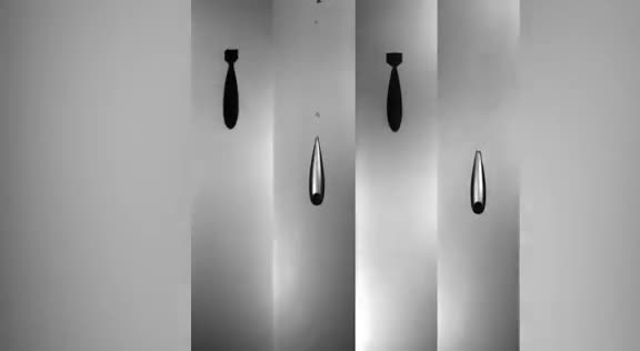 Pointed objects falling through a tank