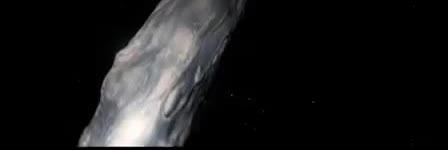 A long rocky asteroid against black space