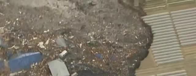 Debris and wrecked buildings left by a tsunami.