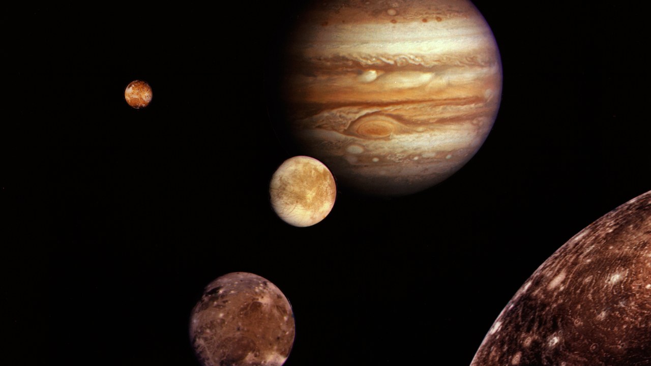 Montage of Jupiter and its four large Galilean moons