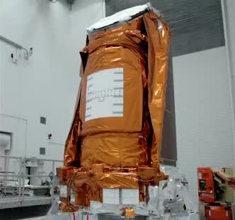 The Kepler spacecraft wrapped in gold insulation.