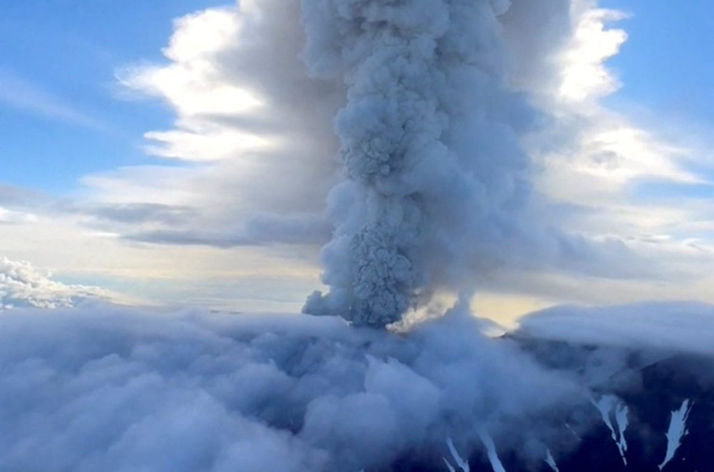 Ash column rising from Krasheninnikov volcano above the clouds, Kamchatka, August 3, 2025