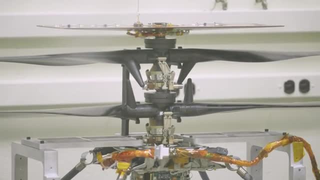 A coaxial Mars helicopter with two rotor sets mounted on a test stand
