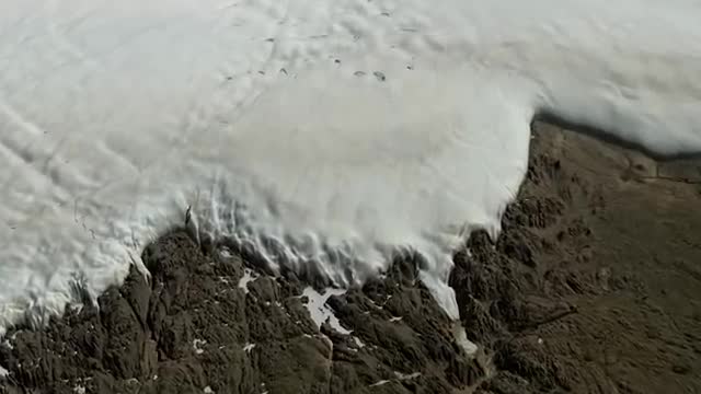 The edge of the Greenland ice sheet against bare rock.