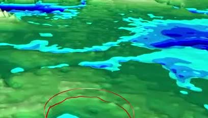 Bed-elevation map of Greenland with a circled impact crater under the ice