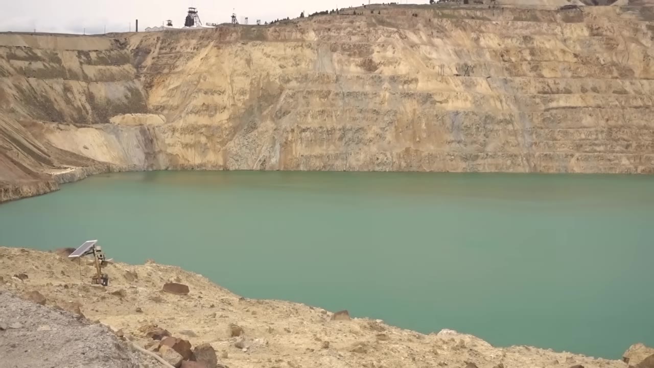 Berkeley Pit, a flooded open-pit copper mine with green water