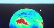A globe colored to show carbon monoxide, with a red band over northern South America.