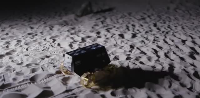 A small rover on a simulated lunar surface