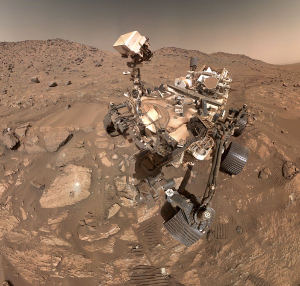 Perseverance rover selfie beside the Cheyava Falls rock in Jezero Crater