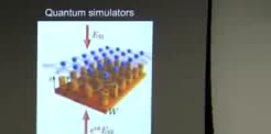 A diagram of atoms arranged in a lattice labeled as a quantum simulator.
