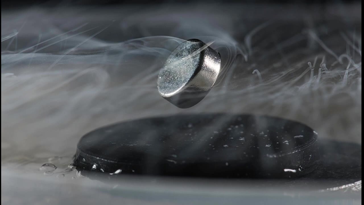 Magnet levitating above a chilled superconducting disk