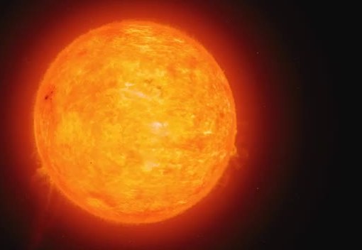 The Sun filling the frame, with bright active regions and a small prominence on the limb.