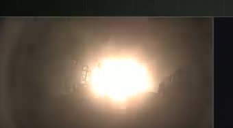 Bright engine plume of a Falcon 9 first stage during its landing burn on the CRS-20 webcast