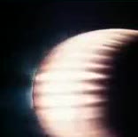 A glowing rocket nozzle with bright exhaust rings.