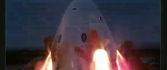 A Crew Dragon capsule descending on engine plumes at dusk.