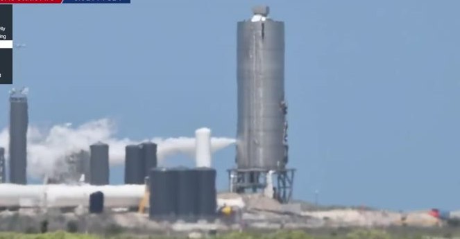 Starship prototype beside the propellant tank farm before a static fire