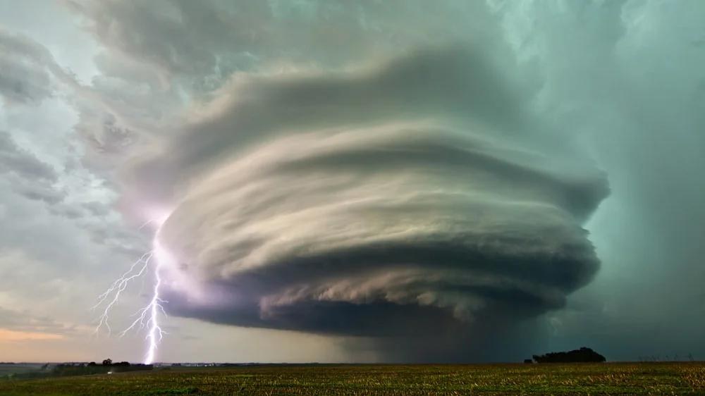 Rotating supercell thunderstorm with lightning over West Point, Nebraska