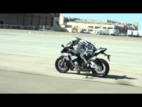 Yamaha Motobot humanoid robot on a motorcycle