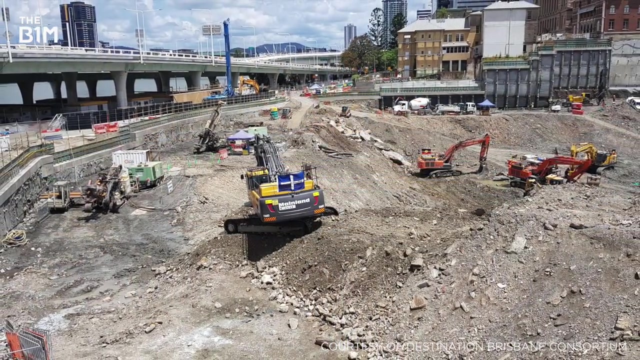 Excavators and a drilling rig on Brisbane Cross River Rail construction site