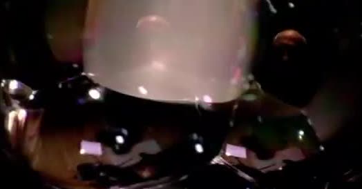 A cube of foam inside a soap bubble