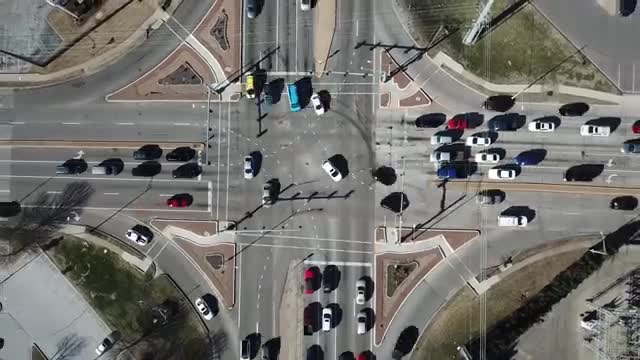 Overhead view of a diverging diamond interchange with traffic crossed to the left