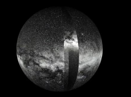 A sphere of the Milky Way built from star positions, with a bright vertical stripe of the disk.