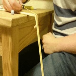 Stick-and-string model showing how the kneecap works as a lever
