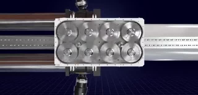 A gearbox of round gears on a wave-energy shaft.